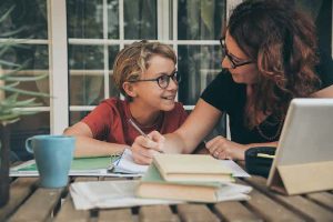 Homeschooling a teacher in home teaching a baby